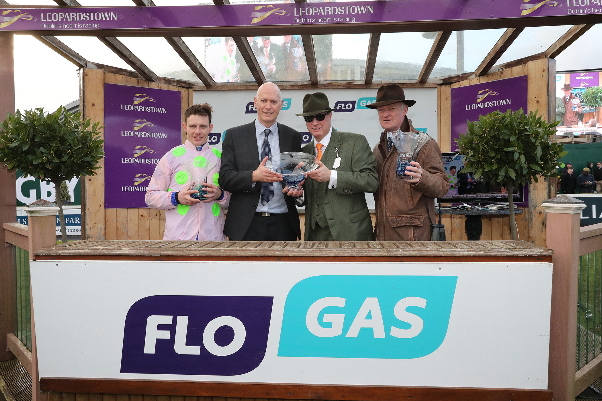 John Rooney, managing director, Flogas Ireland, presents the winner’s trophy to Rich Ricci, owner of Faugheen, winner of the 2020 Flogas Novice Chase on Sun 2nd February at Leopardstown. Also pictured is jockey Peter Townend and trainer Willie Mullins
